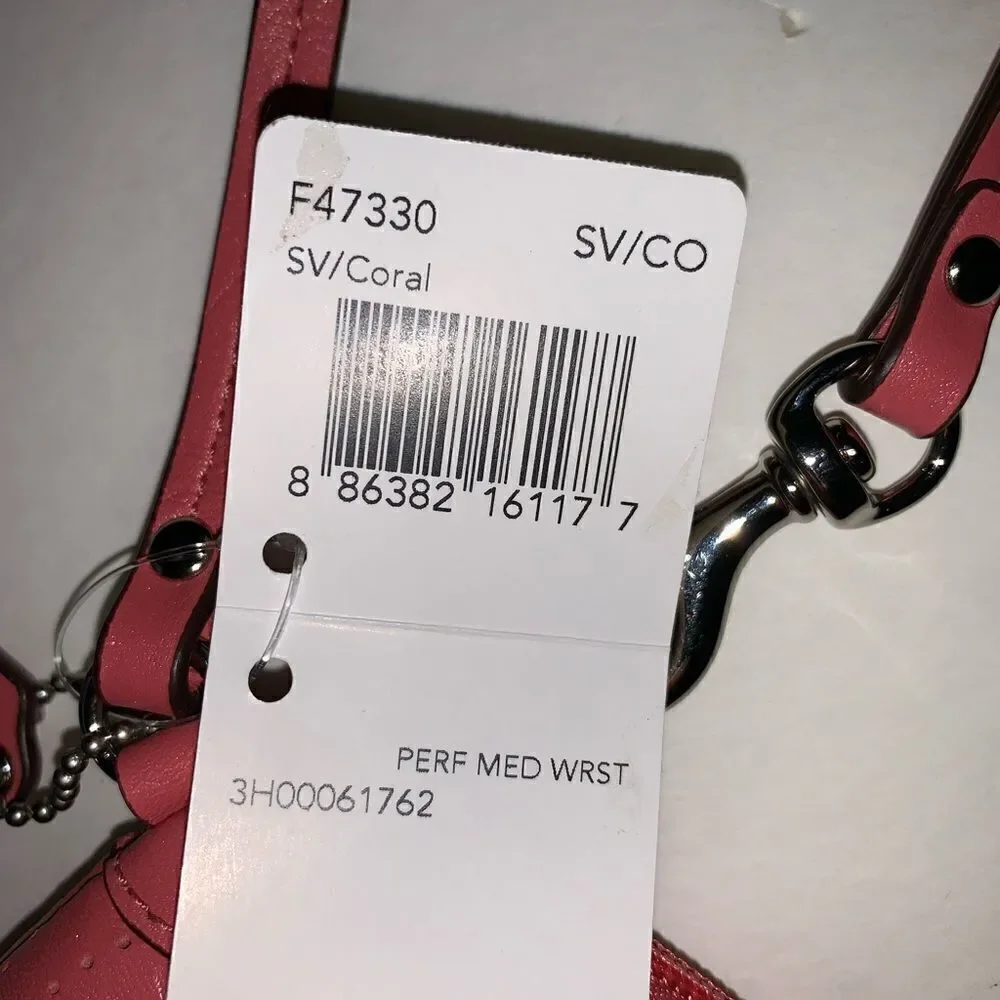 NWT pink Coach wristlet leather